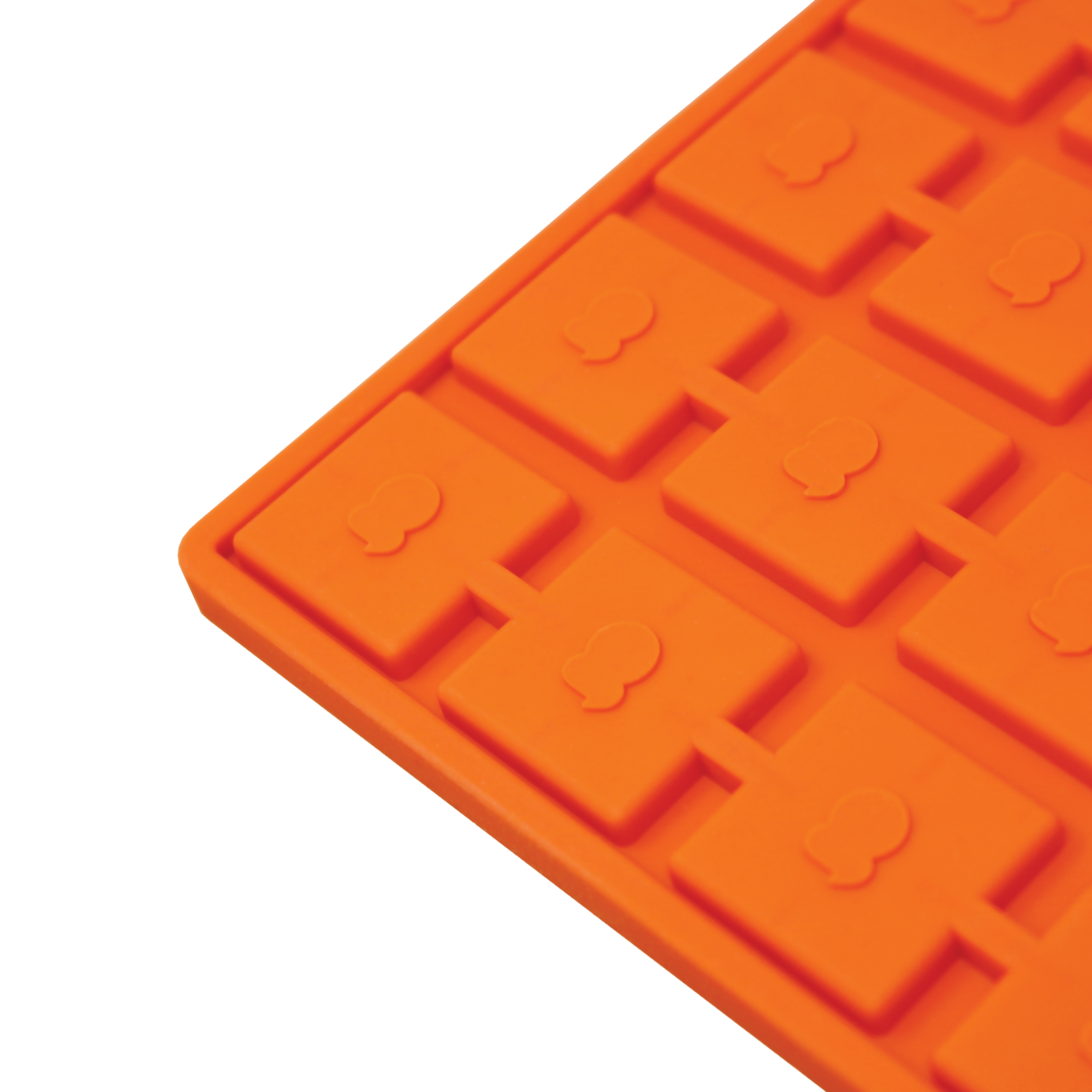 Orange silicone waffle mold on a white background