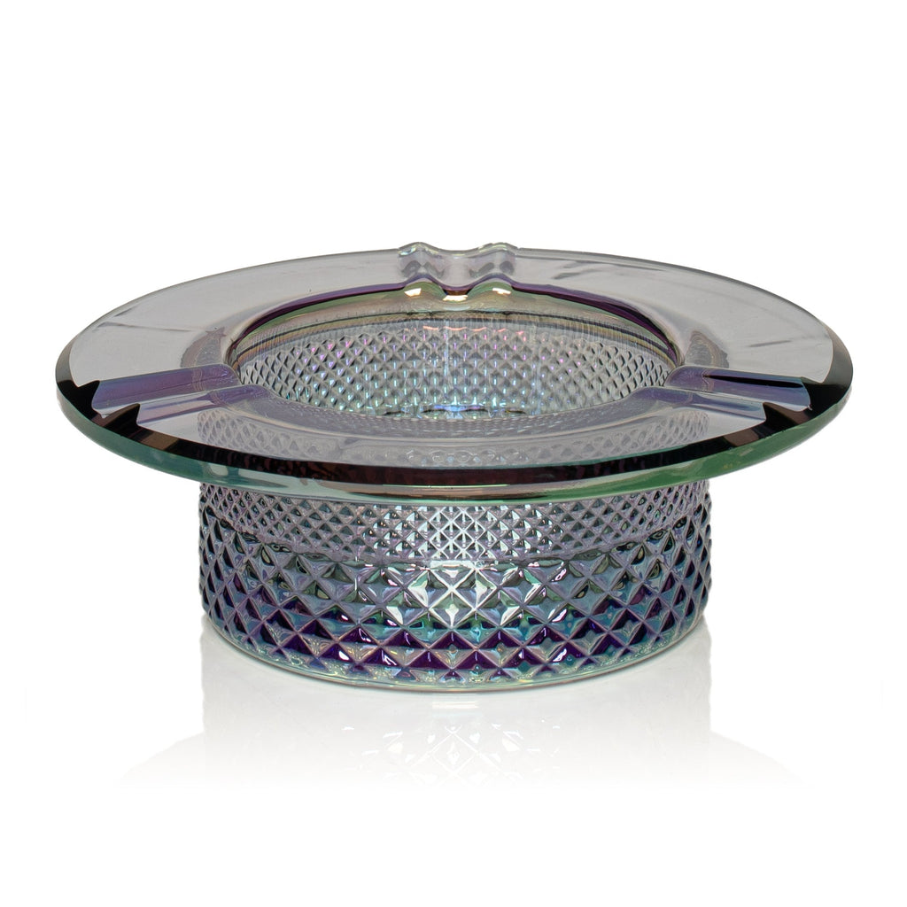 Glass ashtray with diamond pattern on a white background