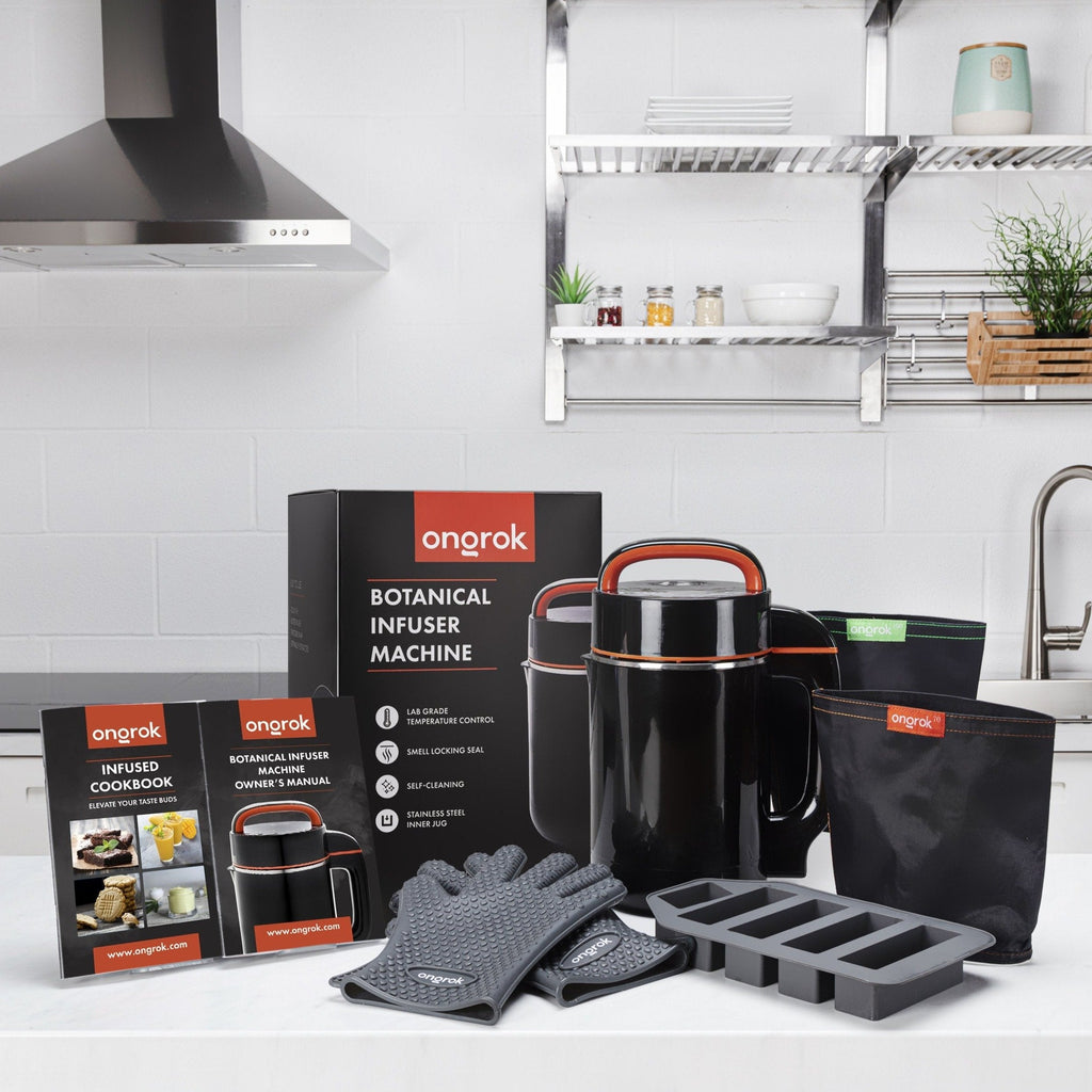 Ongrak botanical infuser machine set with packaging, gloves, and accessories in a kitchen setting.