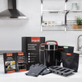 Ongrak botanical infuser machine set with packaging, gloves, and accessories in a kitchen setting.