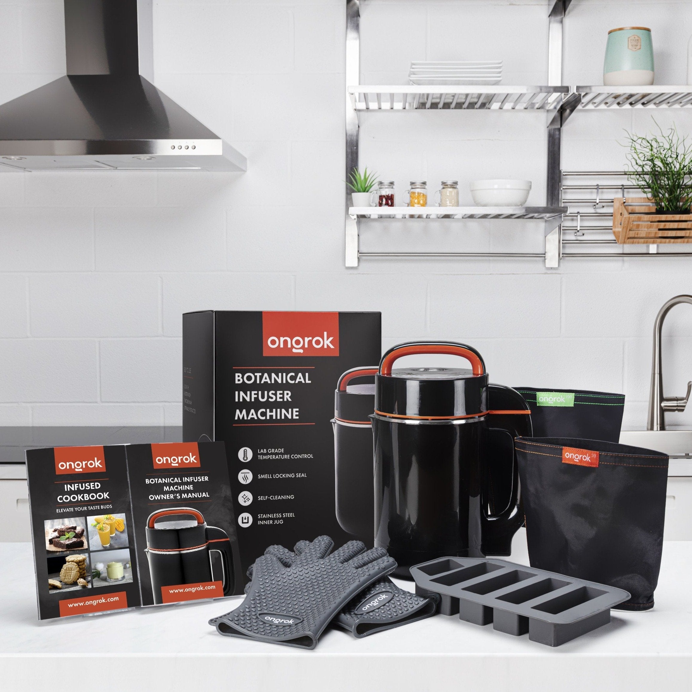 Ongrak botanical infuser machine set with packaging, gloves, and accessories in a kitchen setting.