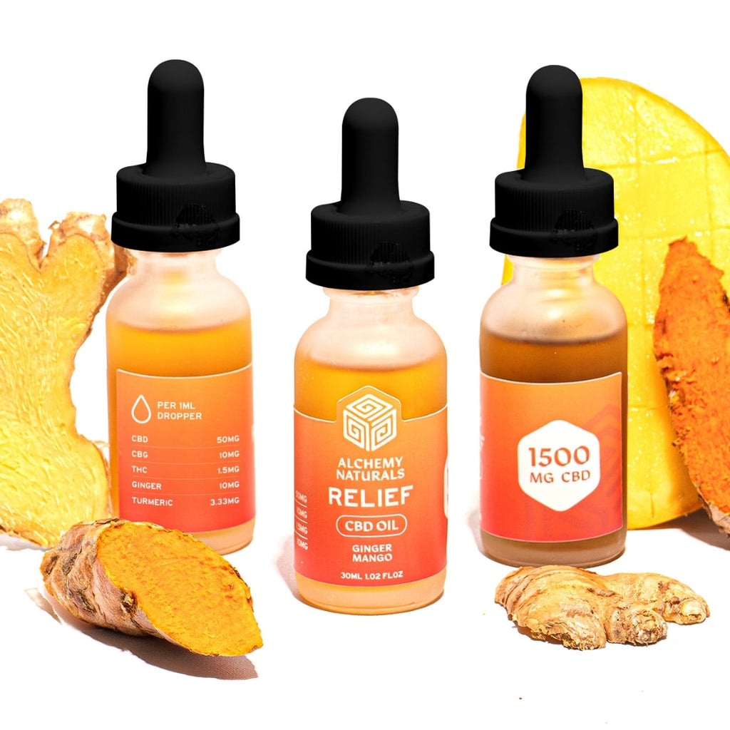 Three bottles of Alchemy Naturals CBD oil with ginger and mango on a white background