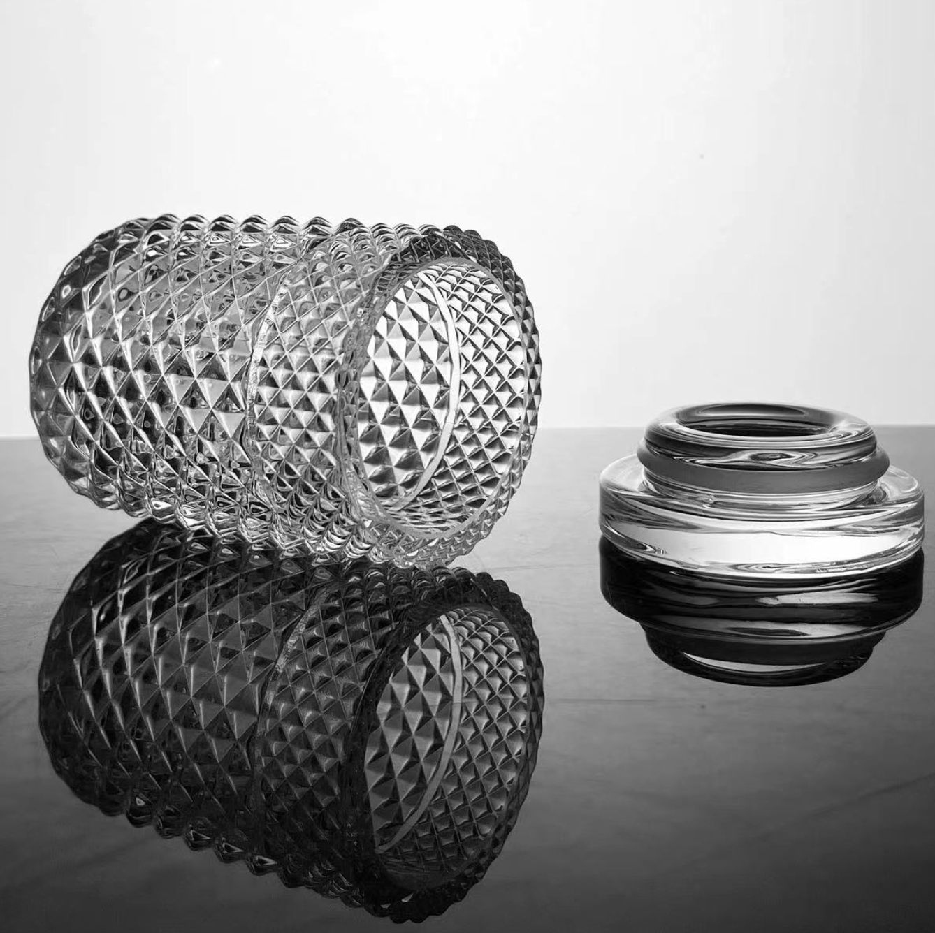 Clear Glass
Storage, refined.

Engineered to nest perfectly inside the Twenties Collection signature ashtray, this jar keeps your setup clean, organized, and visually cohesive between moments.

📦 DETAILS
• 🧪 100% borosilicate glass construction
• 🔒 Silicone-sealed lid for an airtight fit
• 🌿 Designed to help preserve freshness
• 🧩 Designed to nest inside Twenties Collection ashtray
• 📏 Holds up to approx. 1/8 oz
• 🎁 Signature JW box with custom foam insert