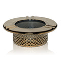 Decorative chrome ashtray with textured design on a white background